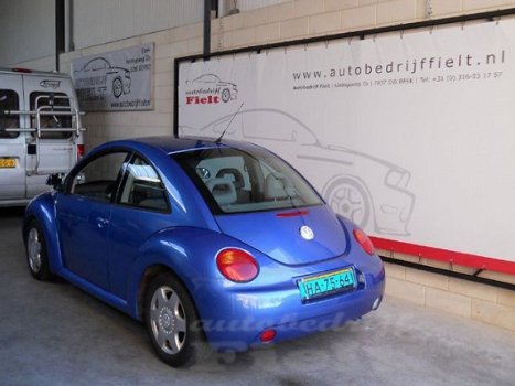 Volkswagen New Beetle - 2.0 Highline - 1