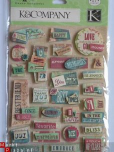 K&Company grand ad. K Margo collage words