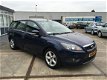 Ford Focus Wagon - Airco - Navi - Cruise Control - 1.6 TDCi Comfort - 1 - Thumbnail