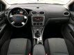 Ford Focus Wagon - Airco - Navi - Cruise Control - 1.6 TDCi Comfort - 1 - Thumbnail