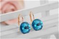 prachtige oorbellen 18k goud met swarovski kristal licht blauw - 3 - Thumbnail
