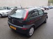 Opel Corsa - 1.0 12V Comfort - 1 - Thumbnail