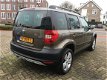 Skoda Yeti - 1.2 TSI Ambition Inclusief 1 jaar garantie - 1 - Thumbnail