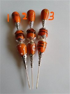 Hoedenspelden / stickpins ( oranje tinten)