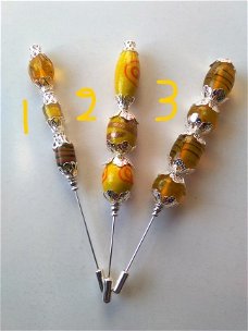 Hoedenspelden / stickpins (geel tinten )