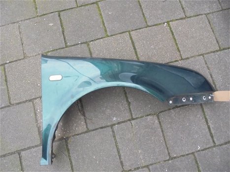 VW Bora 1998/2005 Spatbord Links en Rechtsvoor Kleur LC6M - 1