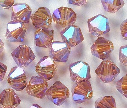 Swarovski 5301 Light Smoked Topaz AB2x 4mm Per 10 Stuk. - 1