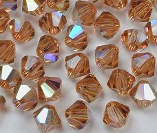 Swarovski 5301 Light Smoked Topaz AB 4mm Per 10 Stuk