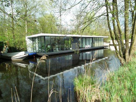 Luxe woonboot te huur in Nationaal Park De Weerribben-Wieden nabij Giethoorn - 1