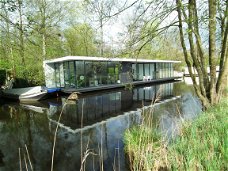 Luxe woonboot te huur in Nationaal Park De Weerribben-Wieden nabij Giethoorn