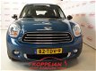 Mini Mini Countryman - 1.6 Chili Navi half Leder - 1 - Thumbnail