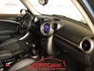 Mini Mini Countryman - 1.6 Chili Navi half Leder - 1 - Thumbnail