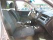 Kia Sportage - 2.0 CVVT 2WD X-tra AIRCO/CRUISE/LM Nette auto - 1 - Thumbnail