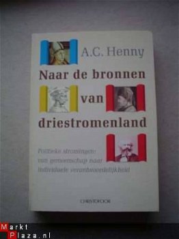 Naar de bronnen van driestromenland door A.C. Henny - 1