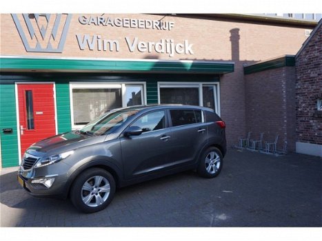 Kia Sportage - 2.0 CVVT X-ecutive - 1