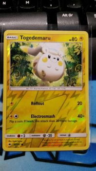 Togedemaru 47/147 Common (reverse) sm burning shadows - 1