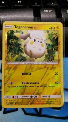 Togedemaru  47/147 Common (reverse) sm burning shadows