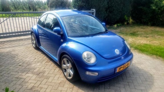 Volkswagen New Beetle - 2.0 Highline - 1