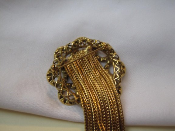 Broche antiek goudkleurig met sliertjes en heldere kristal rijnsteen cirkels 4.0x8.7 cm - Afbeelding 4