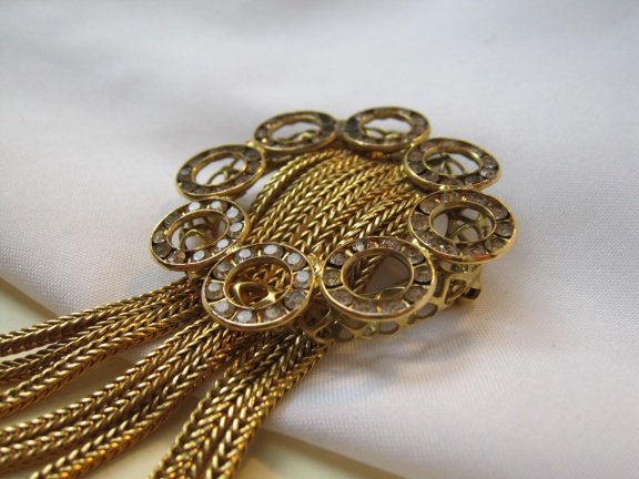 Broche antiek goudkleurig met sliertjes en heldere kristal rijnsteen cirkels 4.0x8.7 cm - Afbeelding 5