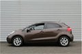 Kia Rio - 1.2 CVVT PLUS PACK | 5-Drs | LED | Airco | 7 Jr Gar | Navi | LM velgen | - 1 - Thumbnail