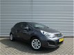 Kia Rio - 1.2 CVVT PLUS PACK | 5-Drs | LED | Airco | 7 Jr Gar | Privacy Glass | Navi | - 1 - Thumbnail