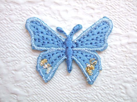 Klein vlindertje strijkapplicatie ~ 3,5 cm ~ Blauw - 0