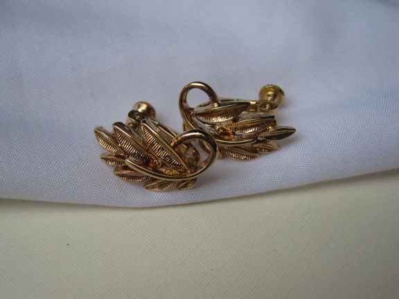 Oorbellen Napier goudkleurig blaadjes model 2.2x1.2 cm - Afbeelding 4