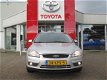 Ford Focus Wagon - 1.6 , Airco, Parkeersensoren - 1 - Thumbnail