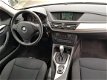 BMW X1 - S-DRIVE AUTOMAAT 150PK NAVI LM VELGEN - 1 - Thumbnail