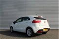 Kia Rio - 1.2 CVVT BUSINESSLINE | 5-Drs | Airco | Cruise | 7 Jr Gar | Navi | - 1 - Thumbnail