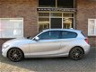 BMW 1-serie - 1-serie 116i Upgrade Edition / Leder / Navi / Xenon / Clima - 1 - Thumbnail