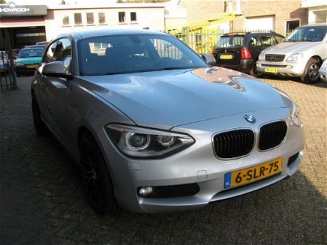 BMW 1-serie - 1-serie 116i Upgrade Edition / Leder / Navi / Xenon / Clima - 1