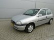 Opel Corsa - 1.4i Strada - 1 - Thumbnail