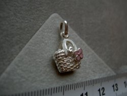 Zilveren tasje met roze bloem hanger