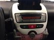Toyota Aygo - 1.0-12V Dynamic Navigator Sport-Edtion/Velgen/geblindeerd ramen/Airco/achterspoiler - 1 - Thumbnail