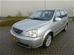 Kia Carens - 2.0 CVVT EX Airco Clima Trekhaak 2005 - 1 - Thumbnail