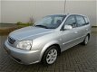 Kia Carens - 2.0 CVVT EX Airco Clima Trekhaak 2005 - 1 - Thumbnail