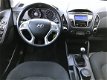 Hyundai ix35 - 1.6I GDI DYNAMIC | Climate Control | Cruise Control | LM Velgen | Elektrische ramen | - 1 - Thumbnail