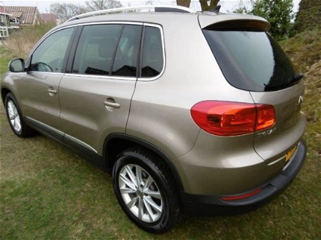 Volkswagen Tiguan - SPORT&STYLE/EXE/NAVI+ /PARKASSIST/INR&GAR.MOG - 1