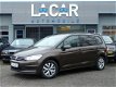 Volkswagen Touran - 1.6 TDI Comfortline 7persoons Navi / Clima / LED Verl. / El. Rmn / El. Spiegels - 1 - Thumbnail