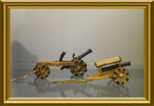 Twee antieke ijzeren miniatuur speelgoed kanonnen - 1