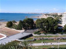Zonnig appartement met groot terras aan strand en boulevard, Valencia, Spanje
