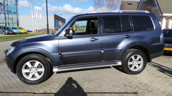 Mitsubishi Pajero - 3.2 DI-D INTENSE SIDE WINDOW VAN 4WD AUT. GRIJS KENTEKEN - 1