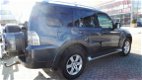 Mitsubishi Pajero - 3.2 DI-D INTENSE SIDE WINDOW VAN 4WD AUT. GRIJS KENTEKEN - 1 - Thumbnail