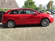 Seat Ibiza ST - 1.2 TDI STYLE ECOMOTIVE | AIRCO | LM VELGEN 17 INCH | DAKRAILS | TREKHAAK | ZUINIG | - 1 - Thumbnail