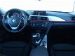 BMW 3-serie - Sedan 320d aut. 163pk Sport Line Xenon Navi Flippers Sportinterieur Afn.Trekhaak - 1 - Thumbnail