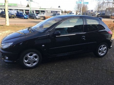 Peugeot 206 - 1.4 XS LEDER CLIMATRONIC 14500 KM NIEUWE DISTRIBUTIESET - 1