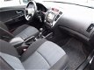 Kia Cee'd - Ceed 1.6 CRDI X-ECUTIVE 5DRS NAVI/ECCAIRCO/PDC/TRKHAAK - 1 - Thumbnail