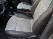 Volkswagen Caddy - 1.6 TDI zijdeur, airco, cruise, imperiaal 12-2013 - 1 - Thumbnail